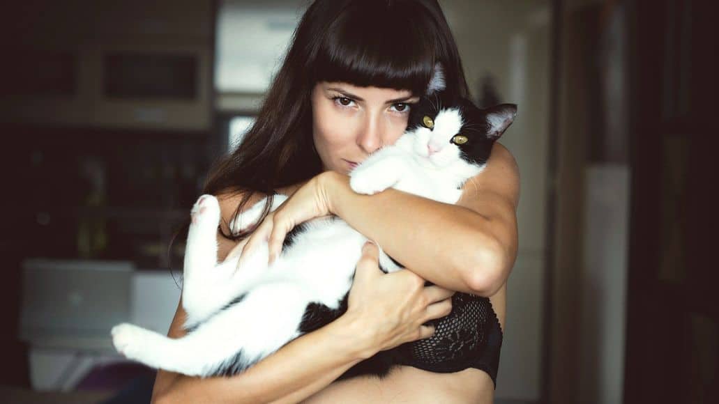 Woman with pet cat