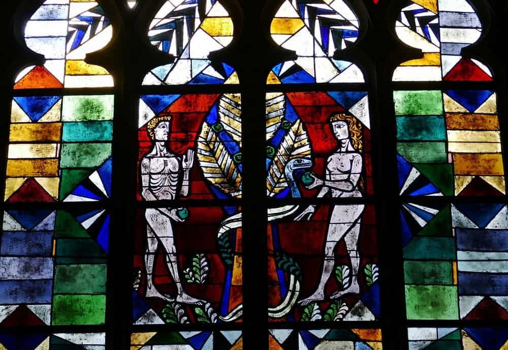 adam eve snake church window